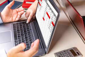 Enterprise employees dealing with spreadsheet problems instead of using modern ERM software