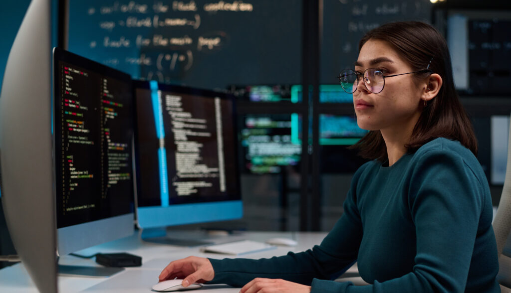 A professional conducting a cybersecurity risk assessment on their computer